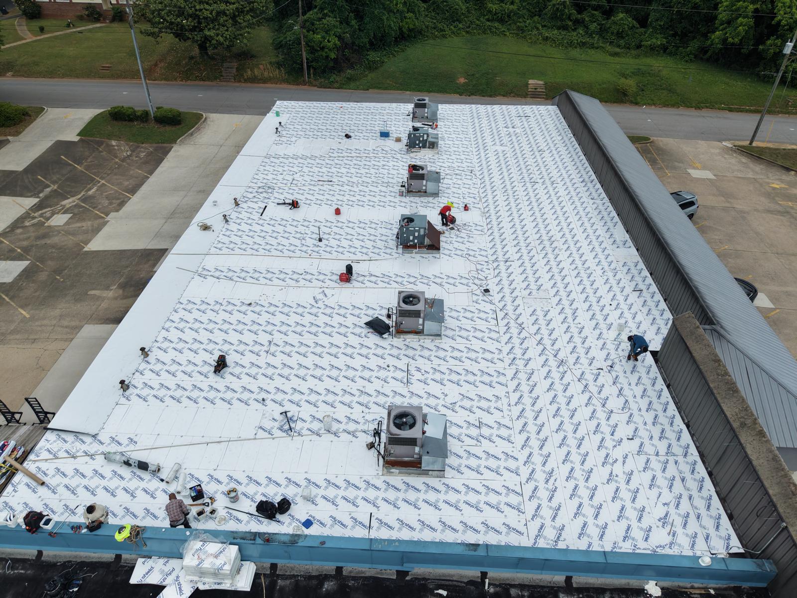 TPO membrane installation on a large commercial roof in Metro Atlanta